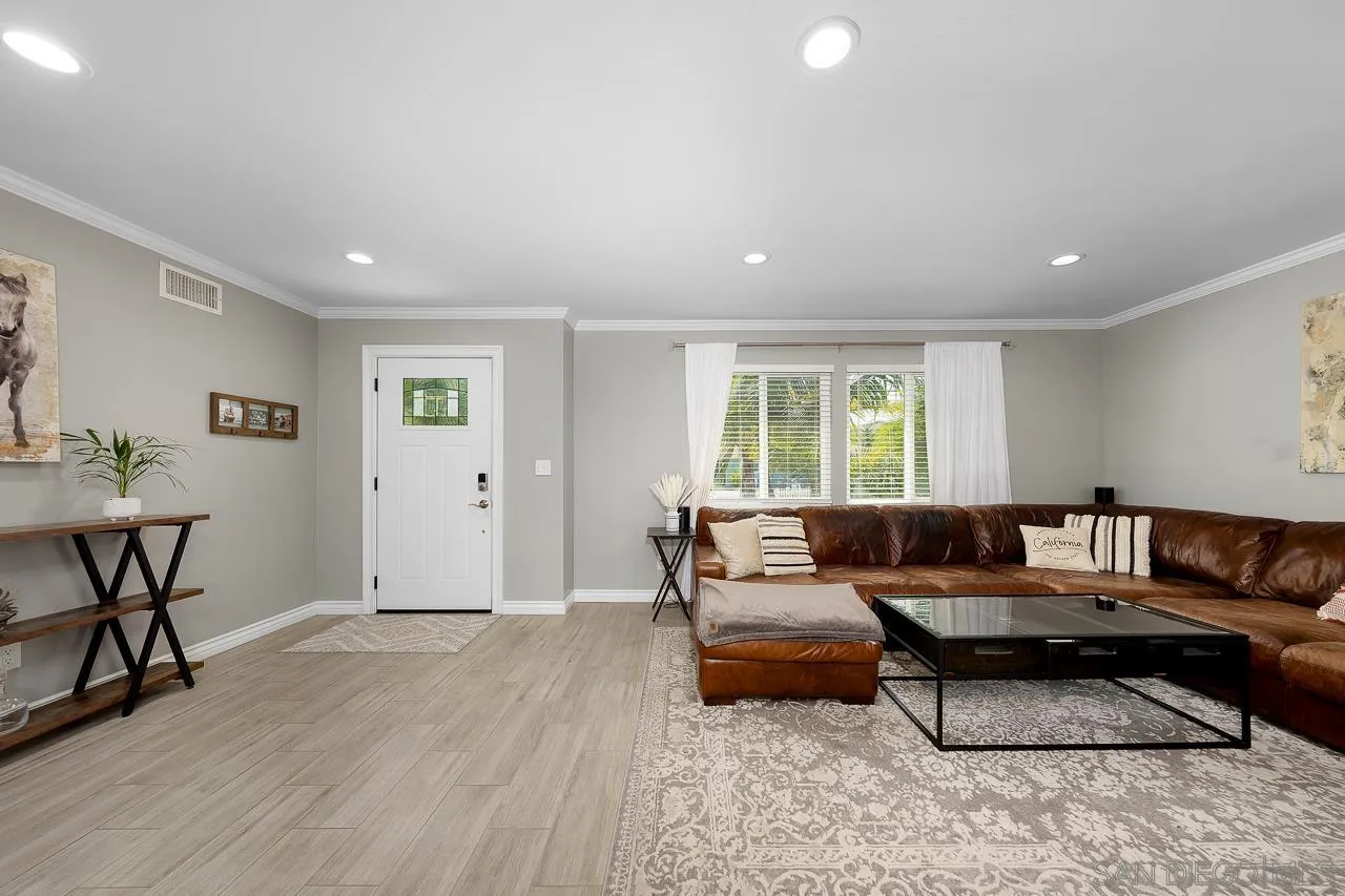 9311 Oakbourne Road Santee, CA 92071 - Photo 8 of 64 a living room with furniture and a large window