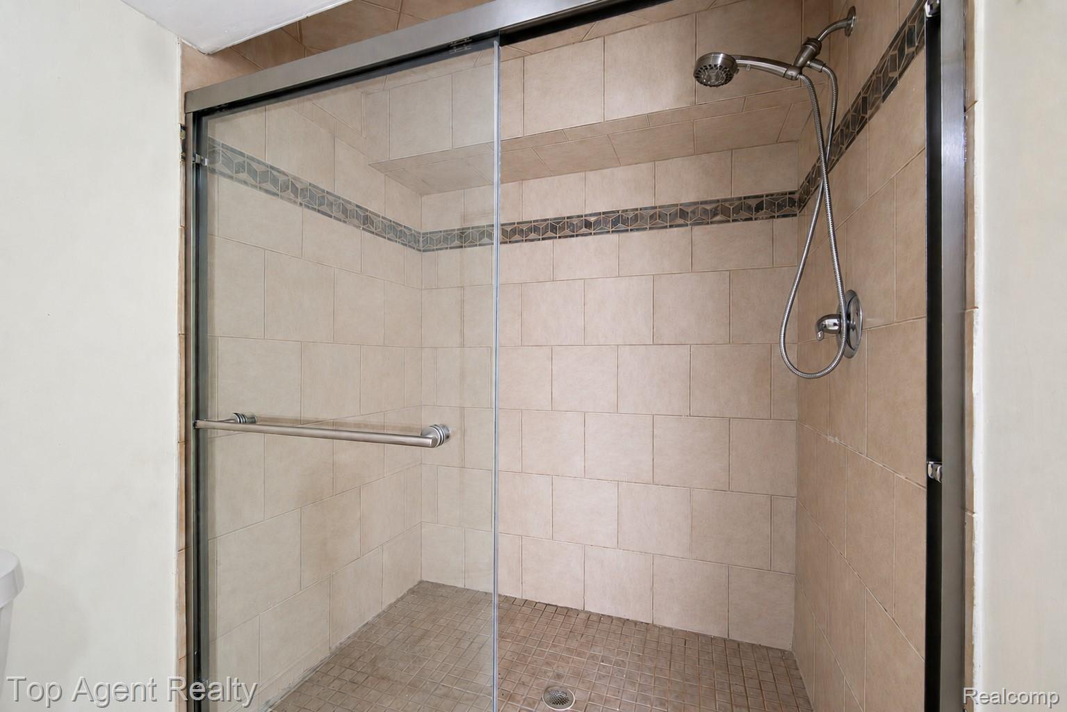 2018 John R Road Troy, MI 48083 - Photo 23 of 30 Full bathroom with a shower stall