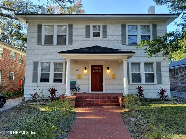 a front view of house with yard