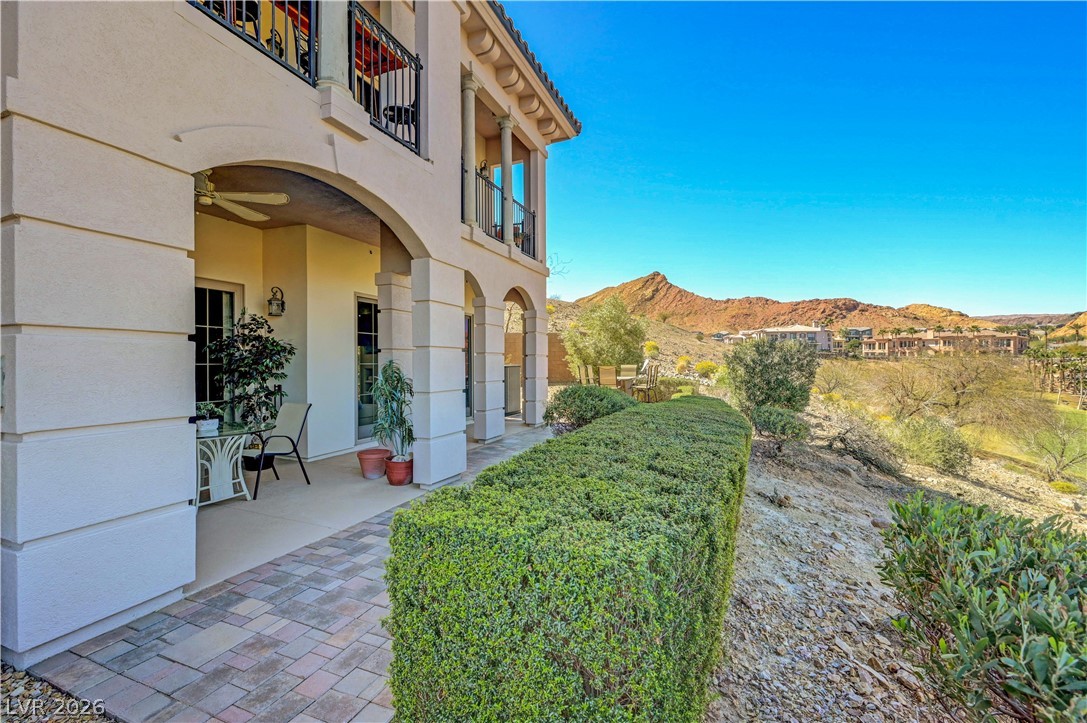 10 Strada Bella Vista, Unit 101 Henderson, NV 89011 - Photo 40 of 64 View of yard featuring a mountain view
