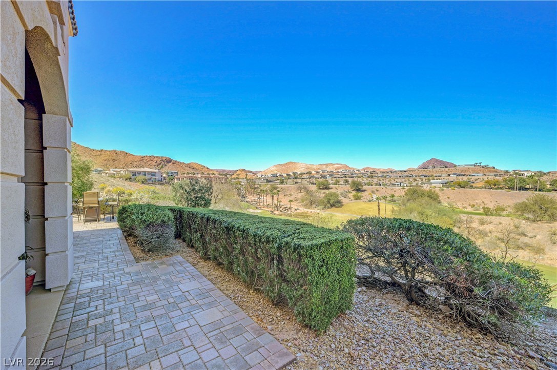 10 Strada Bella Vista, Unit 101 Henderson, NV 89011 - Photo 41 of 64 View of patio featuring a mountain view