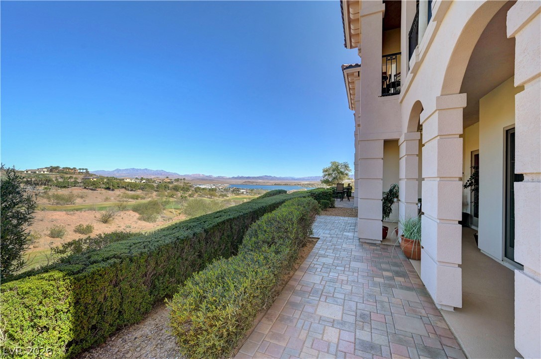 10 Strada Bella Vista, Unit 101 Henderson, NV 89011 - Photo 42 of 64 View of terrace featuring a mountain view and lake view