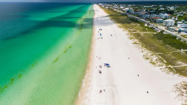 a view of a dinning table and chairs in the patio