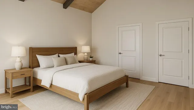 a bed room with a bed and a night stand