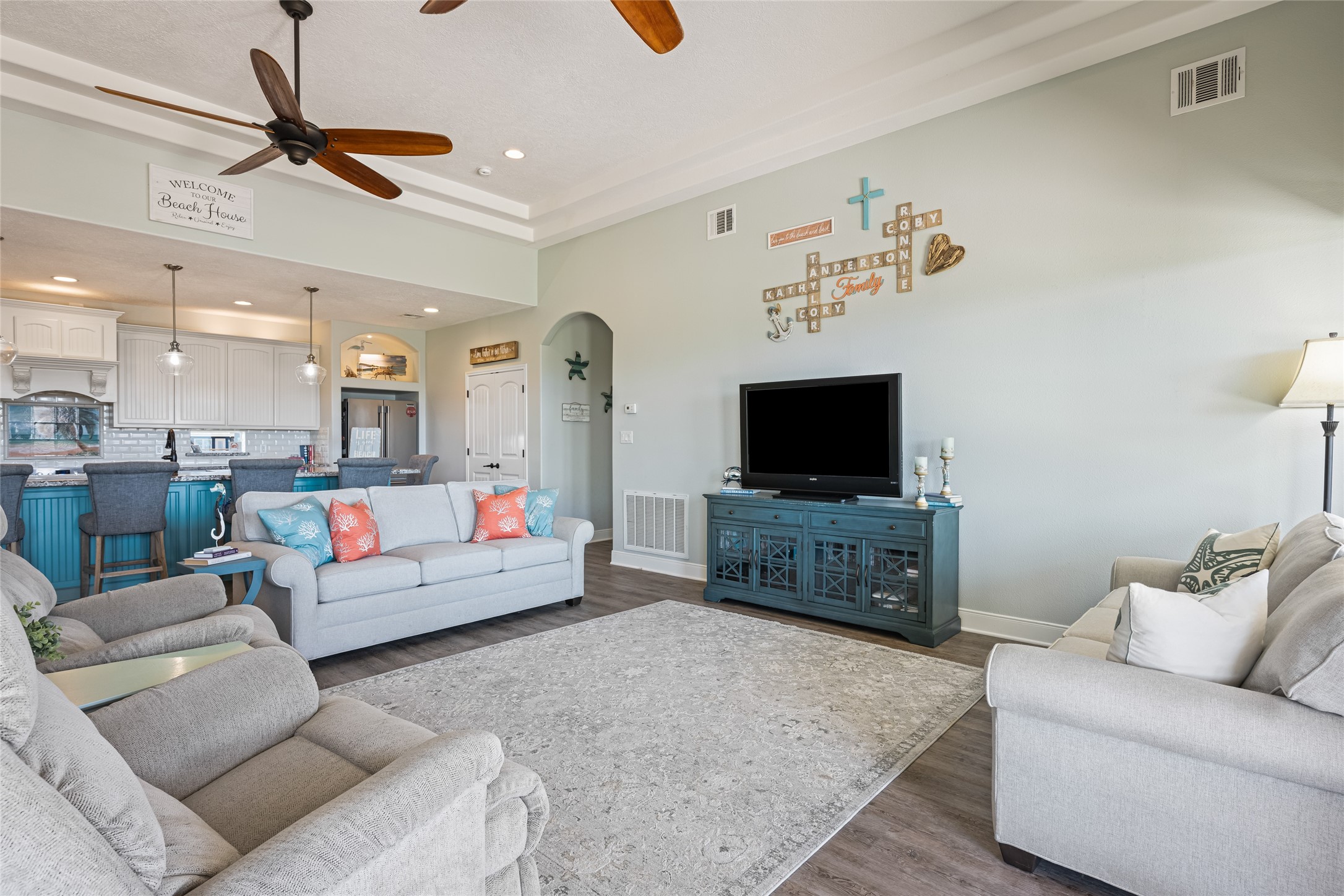 817 Boyt Road Crystal Beach, TX 77650 - Photo 17 of 49 a living room with furniture and a flat screen tv