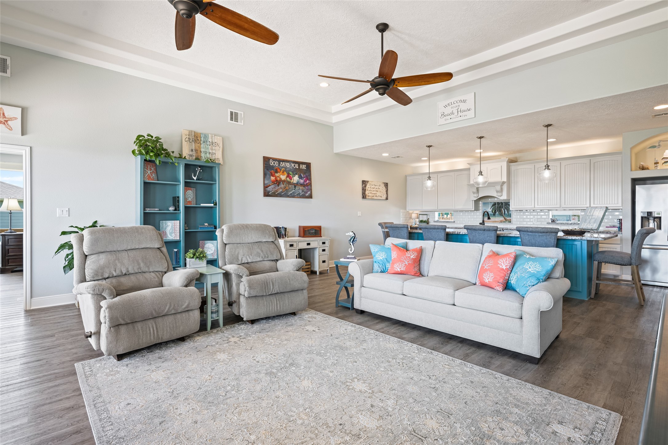 817 Boyt Road Crystal Beach, TX 77650 - Photo 18 of 49 a living room with furniture kitchen view and a window
