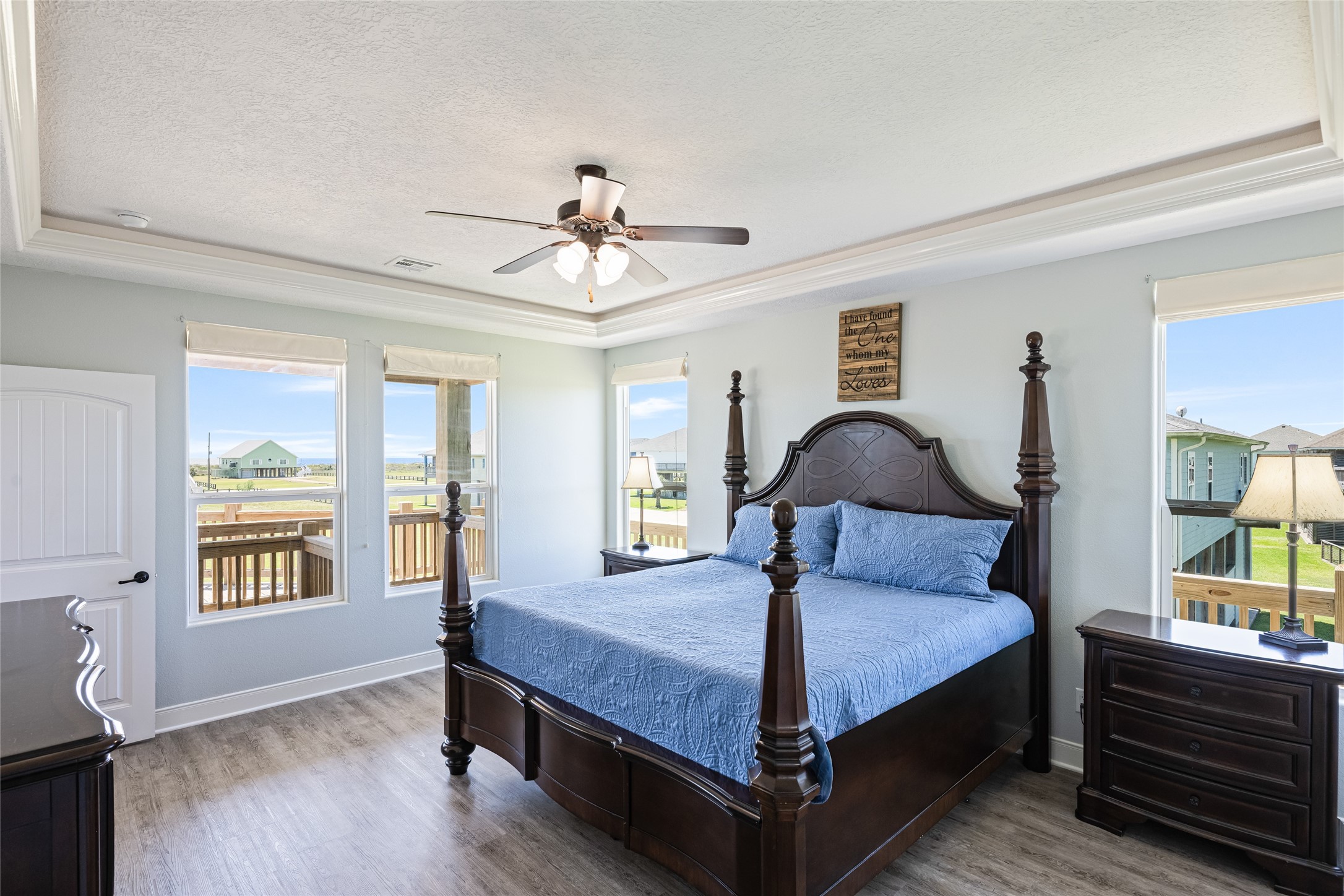 817 Boyt Road Crystal Beach, TX 77650 - Photo 28 of 49 a bedroom with a bed and a window