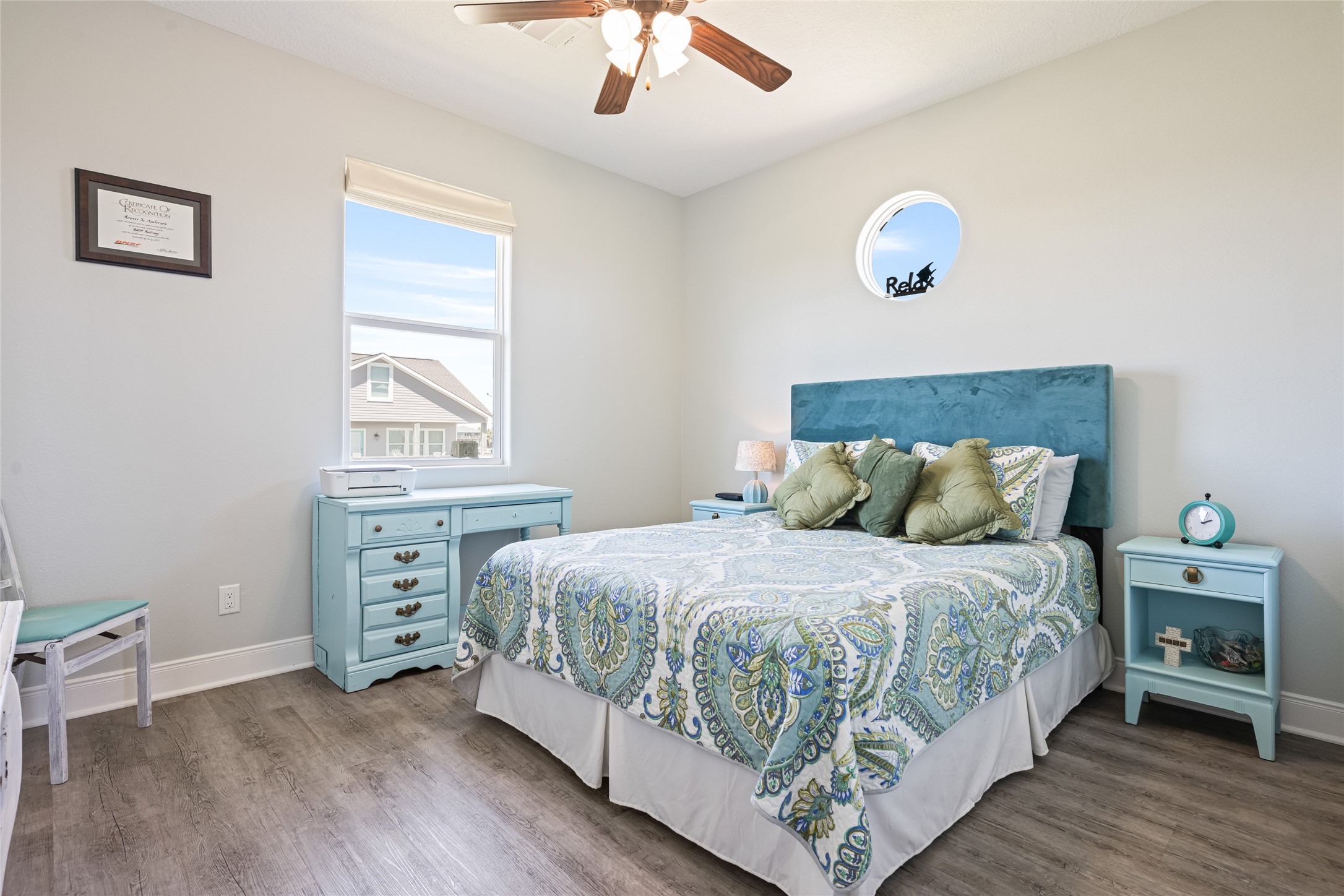 817 Boyt Road Crystal Beach, TX 77650 - Photo 34 of 49 a bedroom with a bed and a window