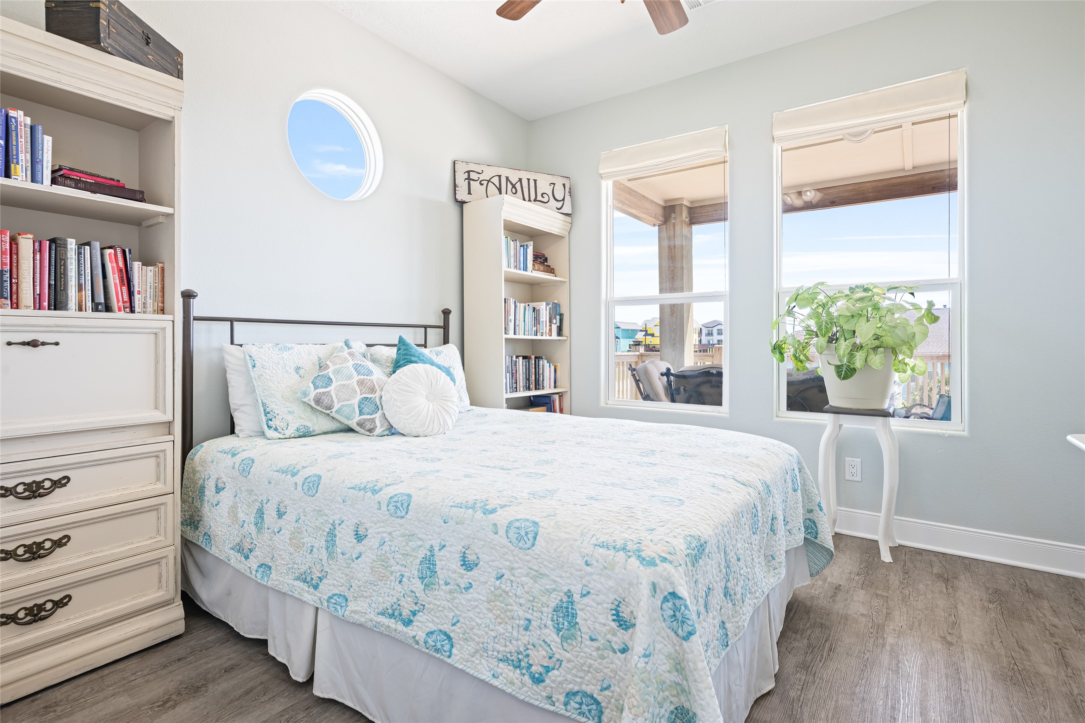 817 Boyt Road Crystal Beach, TX 77650 - Photo 37 of 49 a bedroom with a large bed and a window