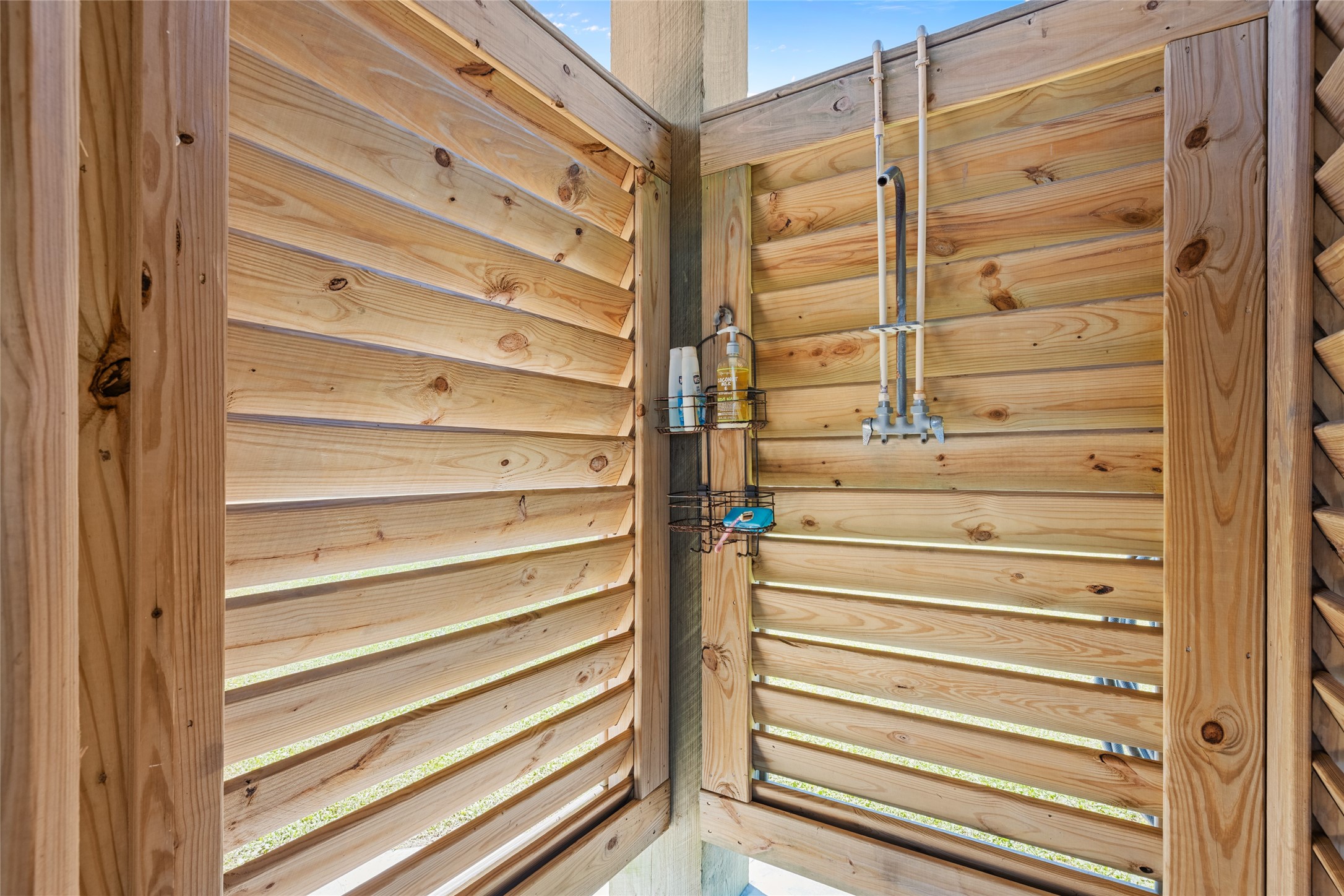 817 Boyt Road Crystal Beach, TX 77650 - Photo 41 of 49 a view of walk in closet with empty racks
