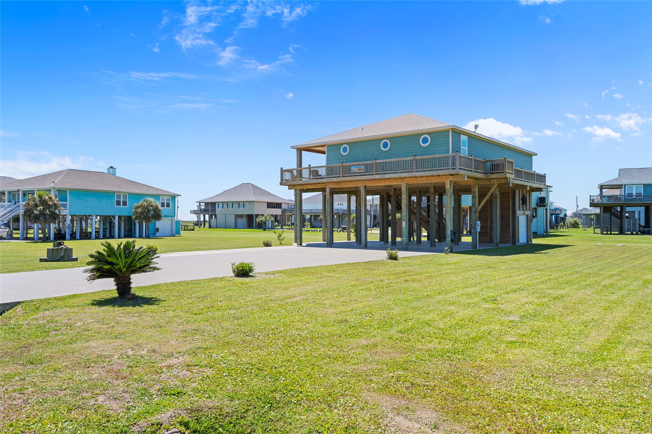 817 Boyt Road Crystal Beach, TX 77650 - Photo 44 of 49 a view of swimming pool with outdoor seating and yard