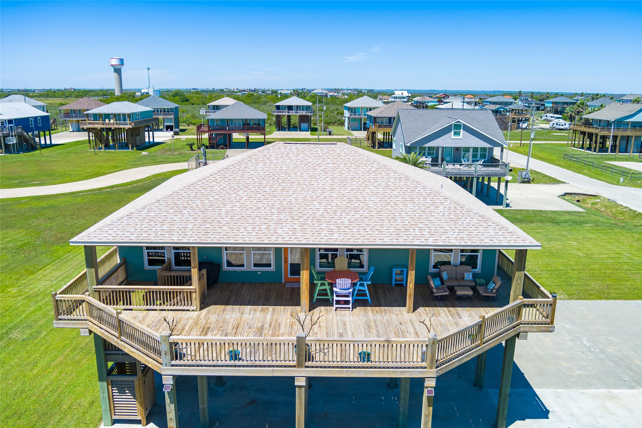 817 Boyt Road Crystal Beach, TX 77650 - Photo 5 of 49 a front view of a house with garden
