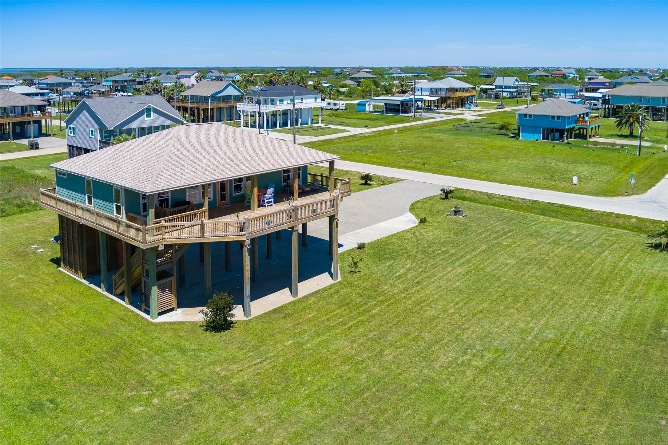 817 Boyt Road Crystal Beach, TX 77650 - Photo 8 of 49 a aerial view of a house with a garden