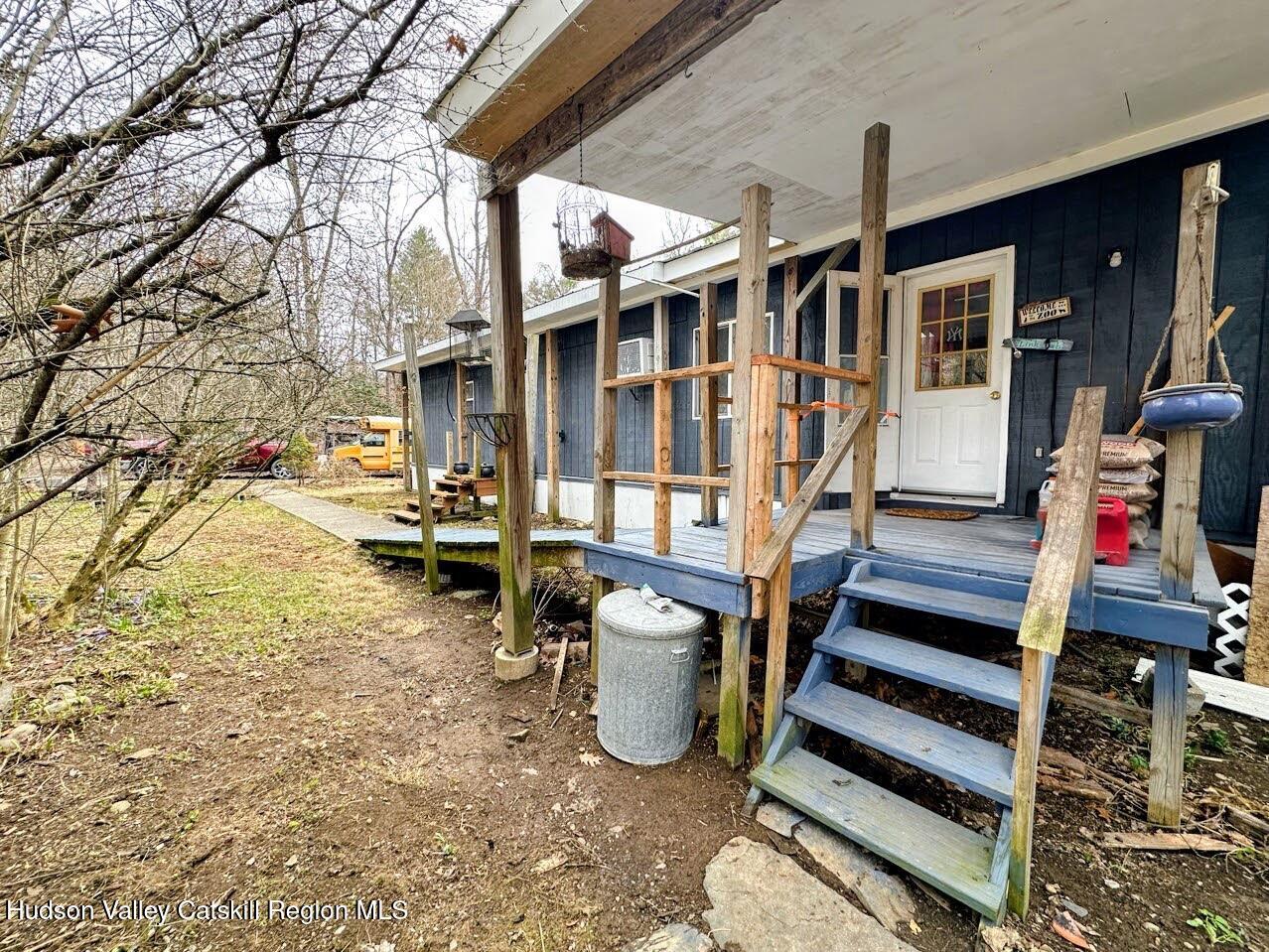 16 Field Road Hudson, NY 12534 - Photo 17 of 24 a view of a patio with table and chairs