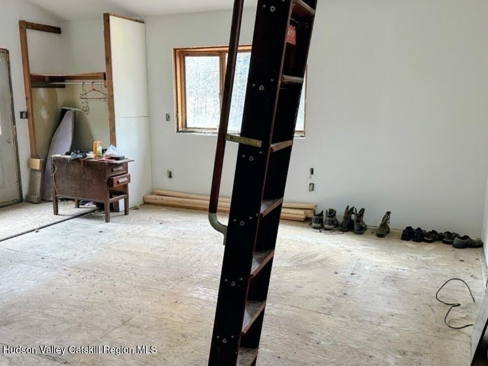 16 Field Road Hudson, NY 12534 - Photo 5 of 24 a view of a livingroom with furniture and a gate
