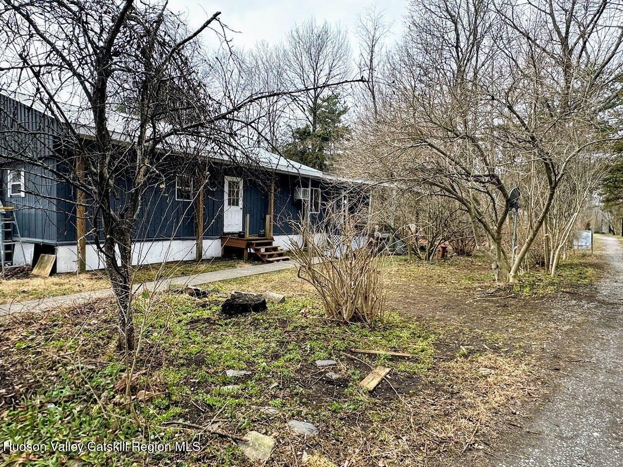 16 Field Road Hudson, NY 12534 - Photo 7 of 24 a view of a yard with a tree