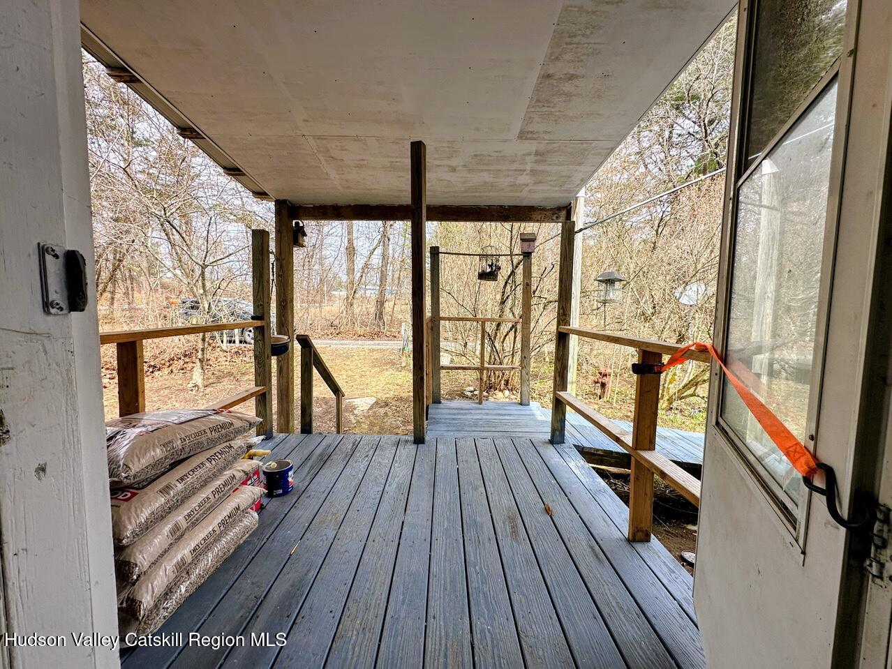 16 Field Road Hudson, NY 12534 - Photo 9 of 24 a view of an empty room with wooden floor and a window
