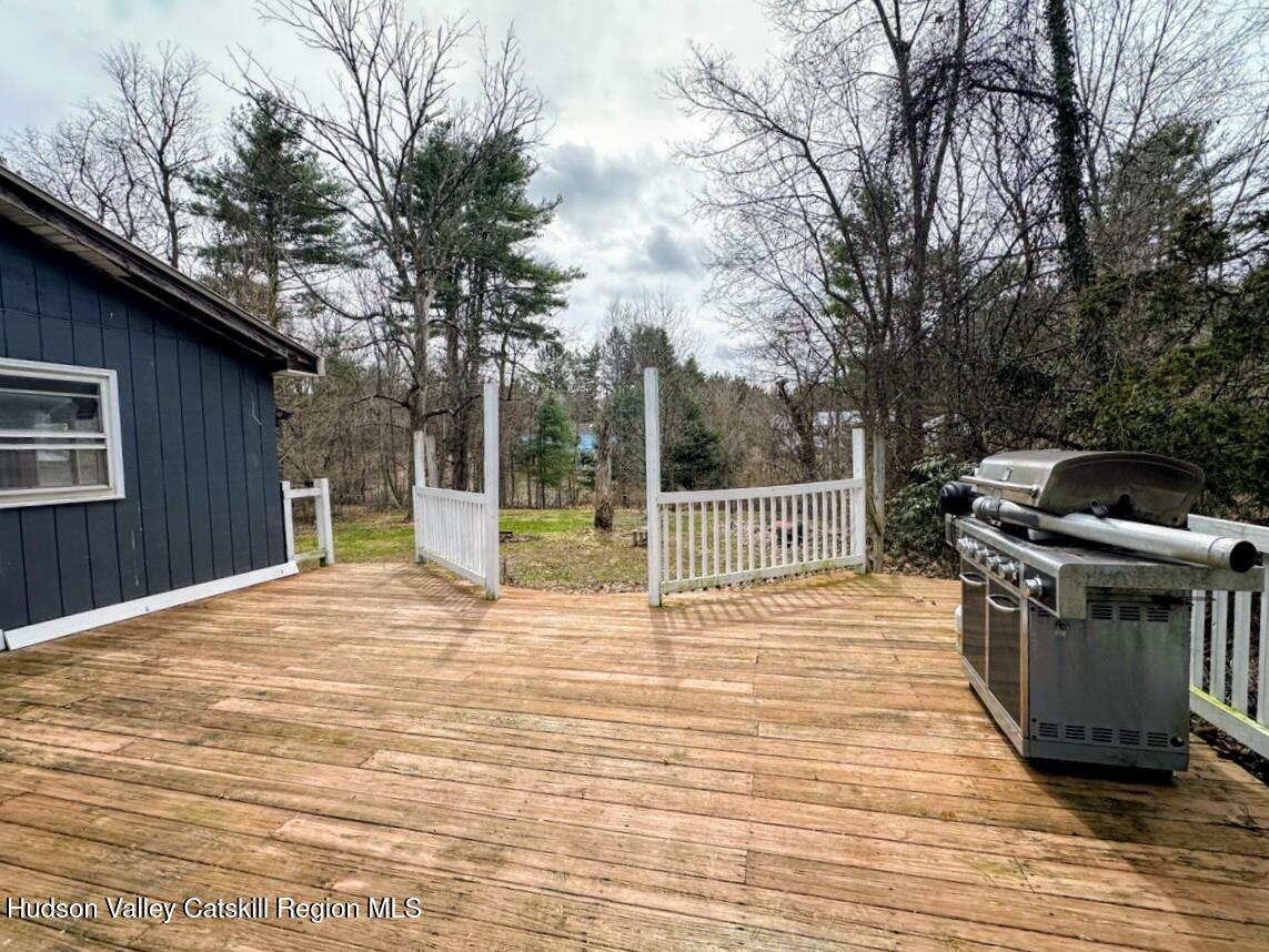 16 Field Road Hudson, NY 12534 - Photo 10 of 24 a view of a deck with a trees