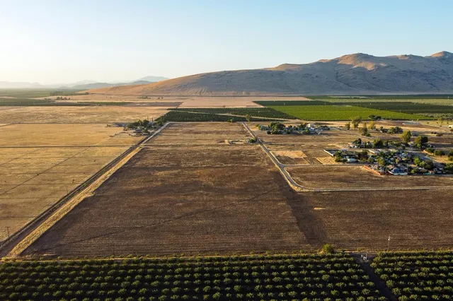 a view of an ocean and a mountain