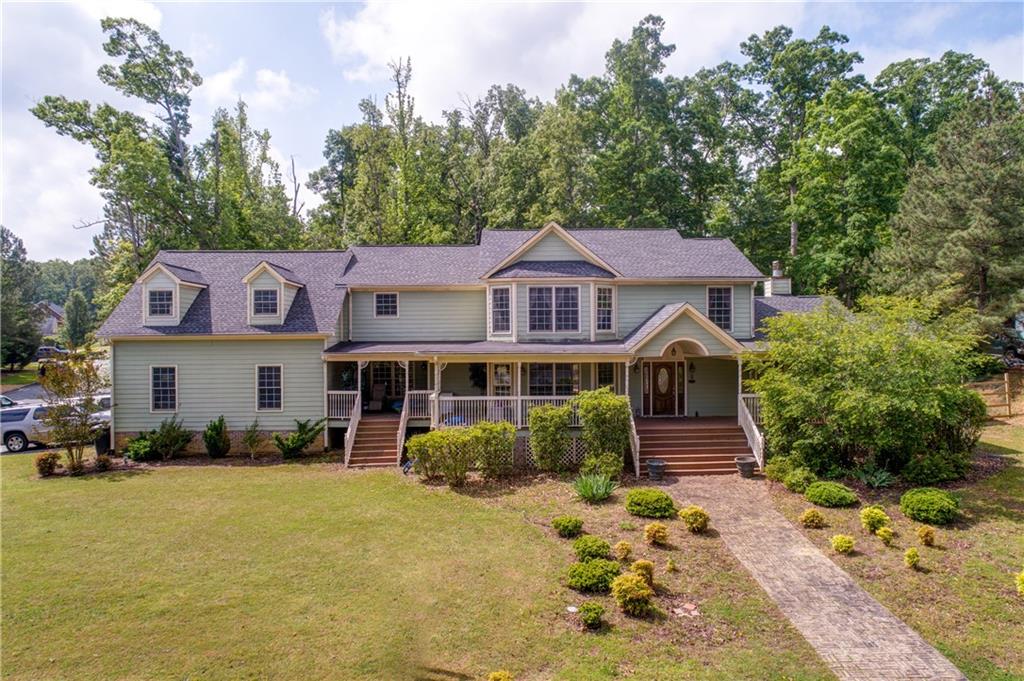 2 Stonebrook Drive Rome, GA 30165 - Photo 1 of 1 a front view of a house with garden