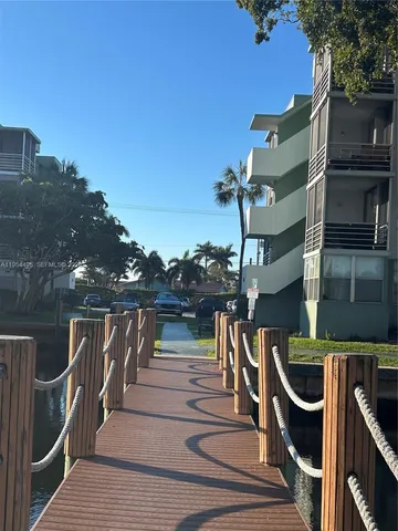 a view of balcony and wooden floor