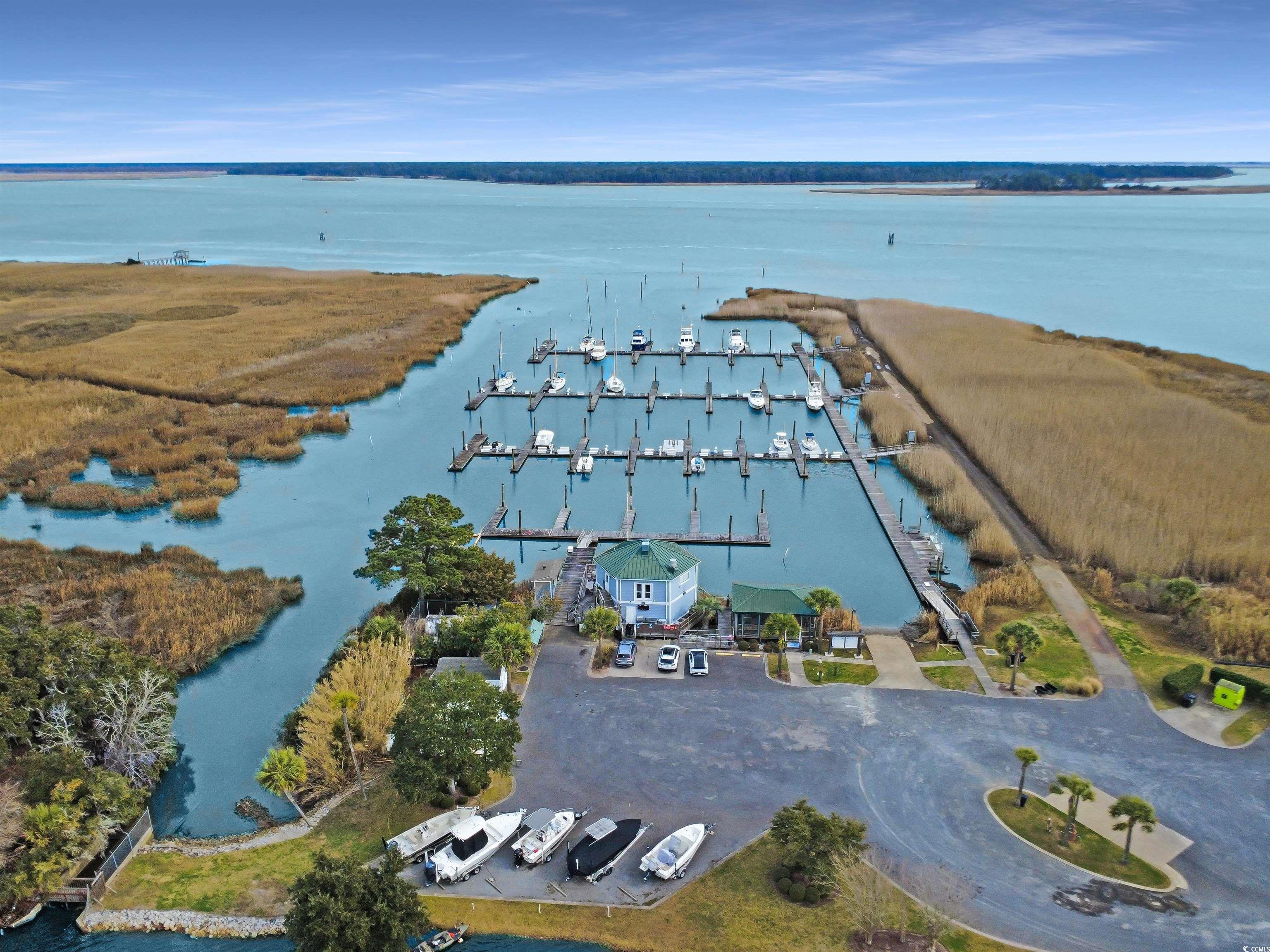 43 Pheasant Loop, Unit 304 Georgetown, SC 29440 - Photo 32 of 38 Aerial overview of property's location with a nearby body of water
