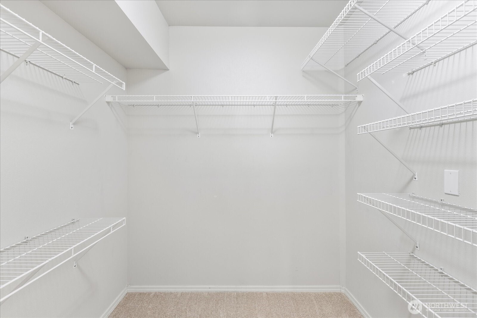 8500 Main Street, Unit F205 Edmonds, WA 98026 - Photo 15 of 30 a view of small space with racks on the wall