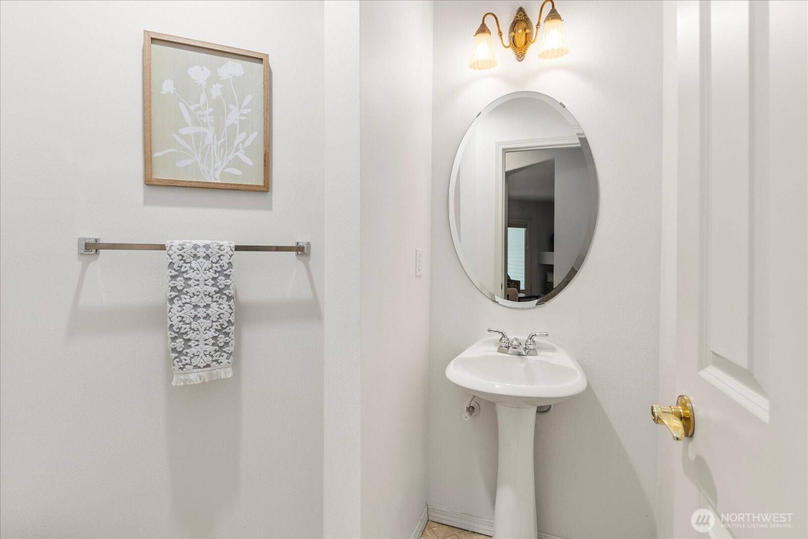8500 Main Street, Unit F205 Edmonds, WA 98026 - Photo 17 of 30 a bathroom with a sink and a mirror