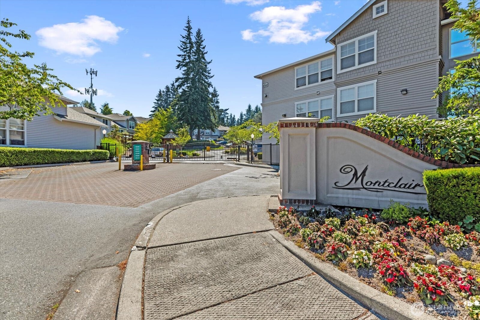 8500 Main Street, Unit F205 Edmonds, WA 98026 - Photo 23 of 30 a view of a street with potted plants