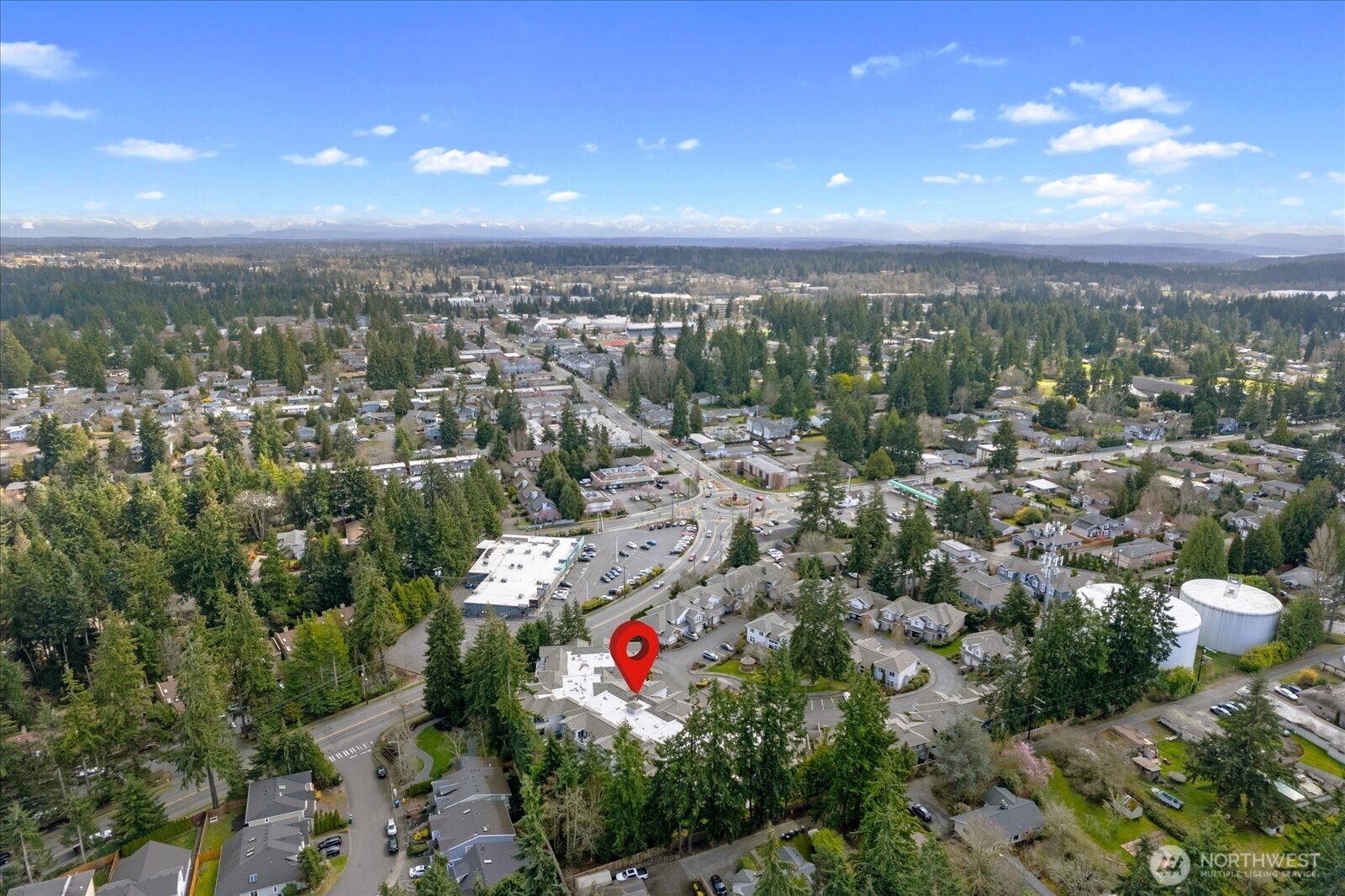 8500 Main Street, Unit F205 Edmonds, WA 98026 - Photo 30 of 30 an aerial view of residential building with green space