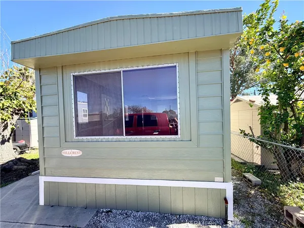 a front view of a house with a garage
