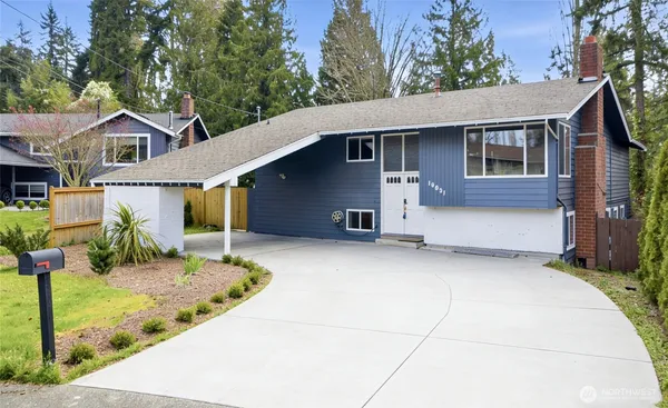 a front view of a house with a garage