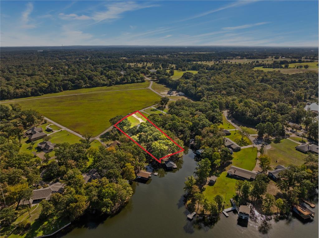 78 County Road 2137 Pittsburg, TX 75686 - Photo 2 of 40 an aerial view of ocean and residential houses with outdoor space