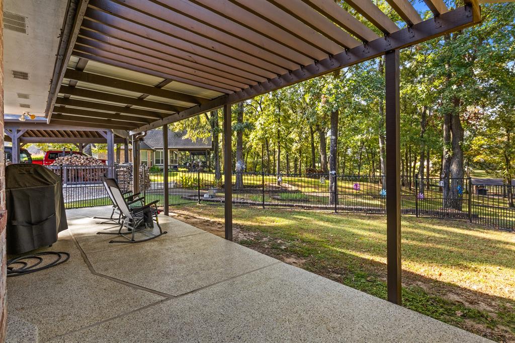 78 County Road 2137 Pittsburg, TX 75686 - Photo 30 of 40 a view of a swimming pool with a patio