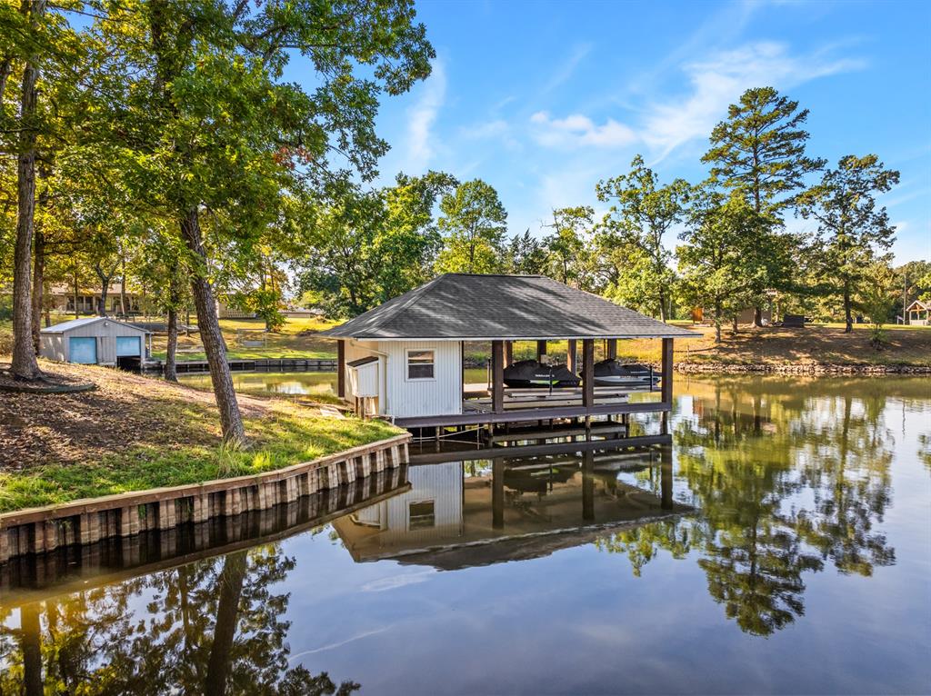 78 County Road 2137 Pittsburg, TX 75686 - Photo 34 of 40 a front view of a house with a yard