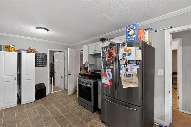 a room with cabinets and flat screen tv