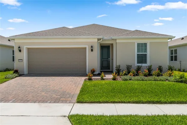 a front view of house with yard