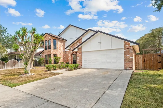 a front view of house with yard