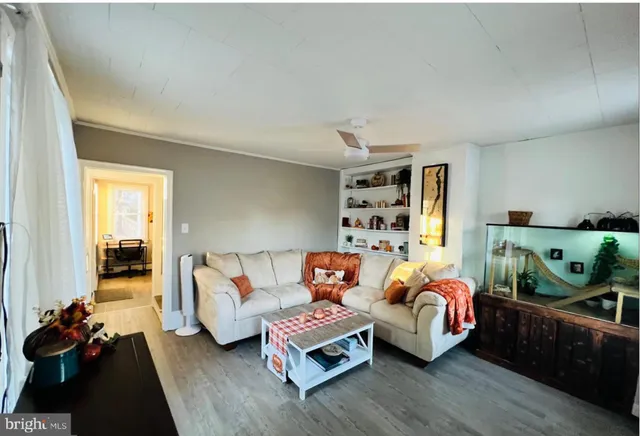 a bedroom with bed and window