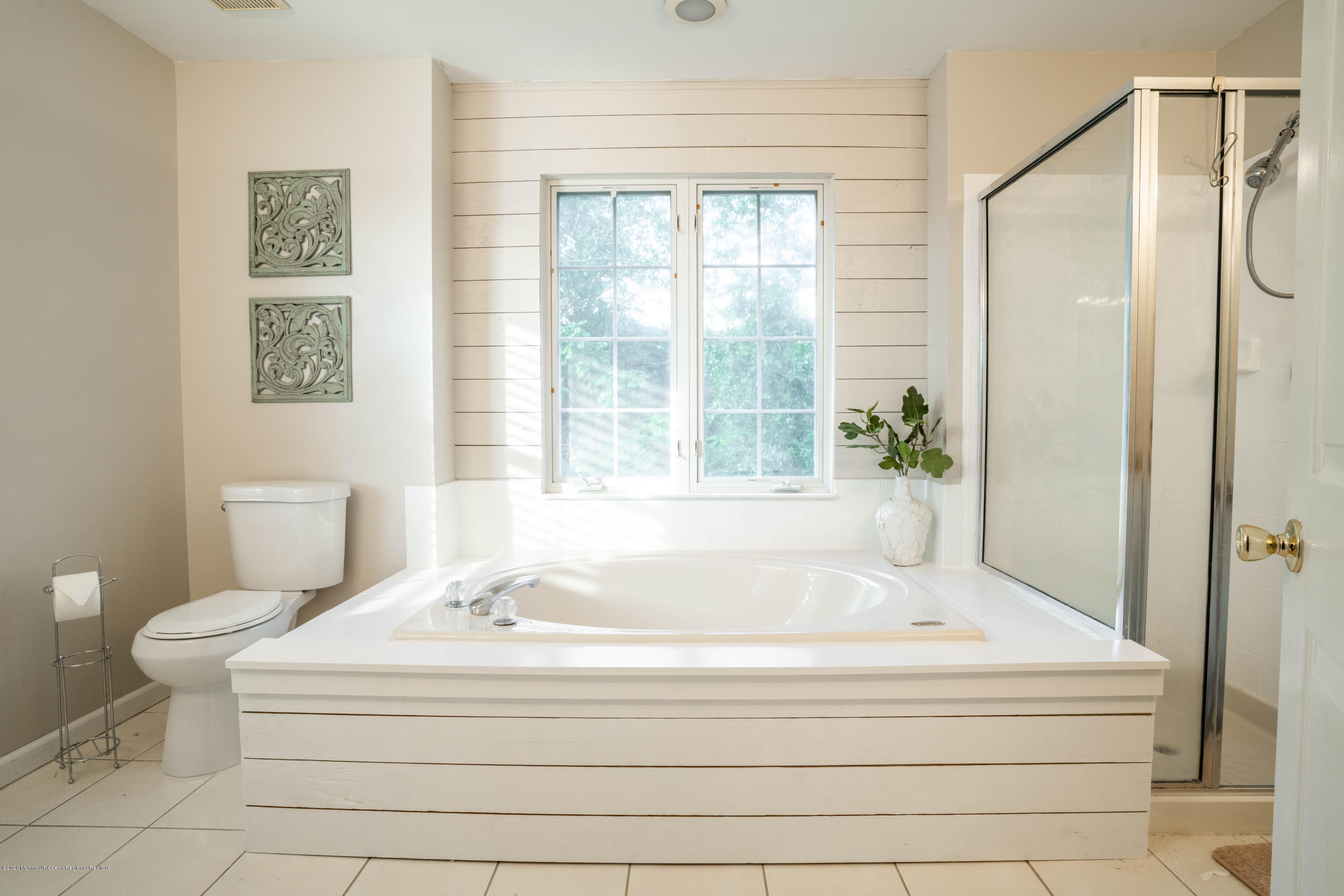 2 Sun Hollow Road Howell, NJ 07731 - Photo 20 of 34 a white bath tub sitting next to a white toilet