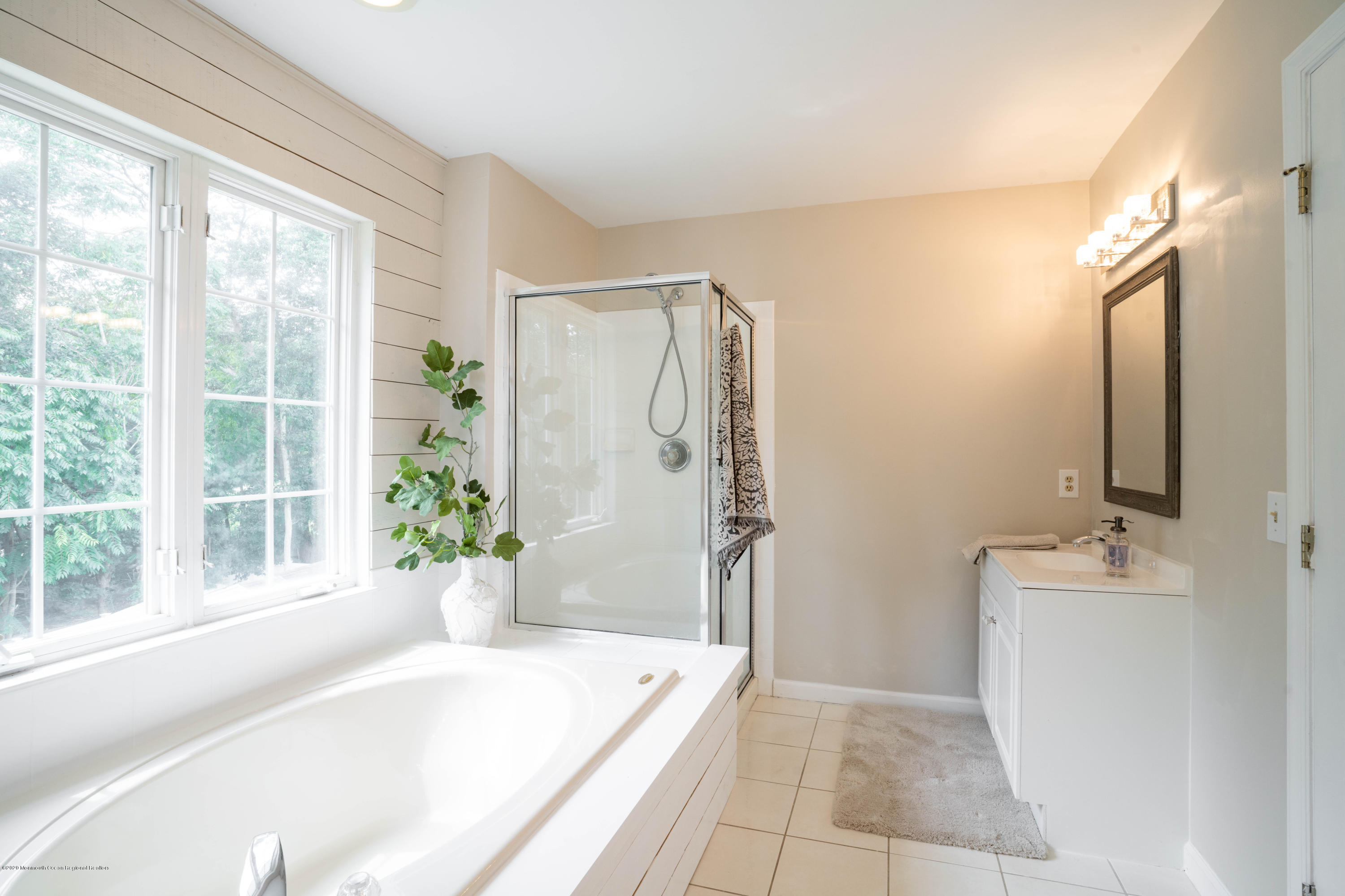 2 Sun Hollow Road Howell, NJ 07731 - Photo 21 of 34 a spacious bathroom with a bathtub and shower