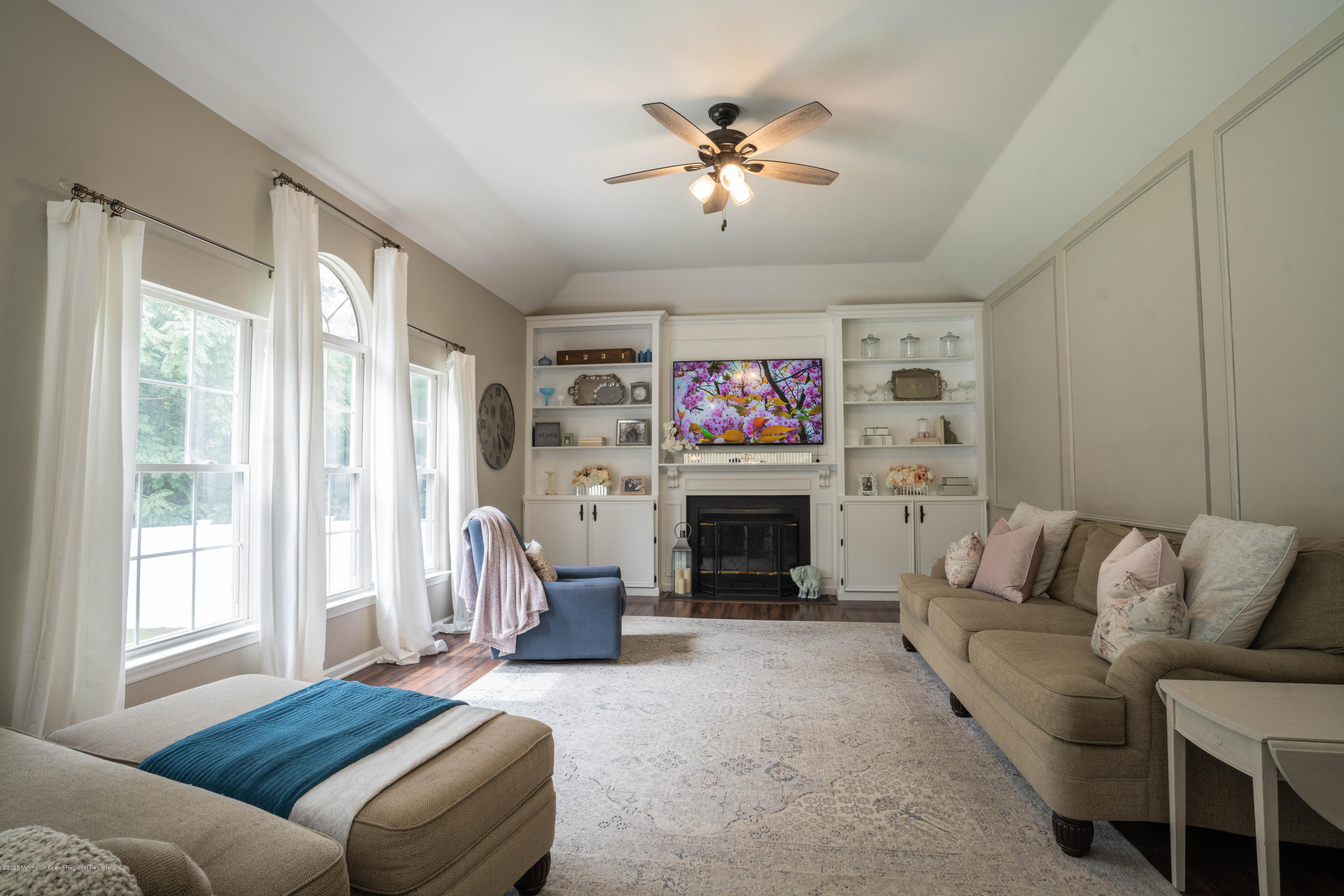 2 Sun Hollow Road Howell, NJ 07731 - Photo 9 of 34 a living room with furniture and a fireplace