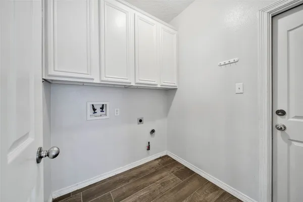 a view of small space with wooden floor