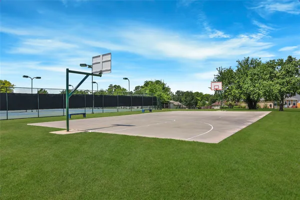 a view of yard with trampoline