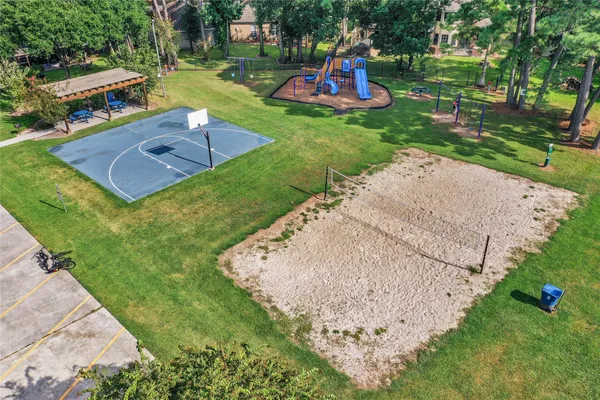 a view of a backyard with swimming pool