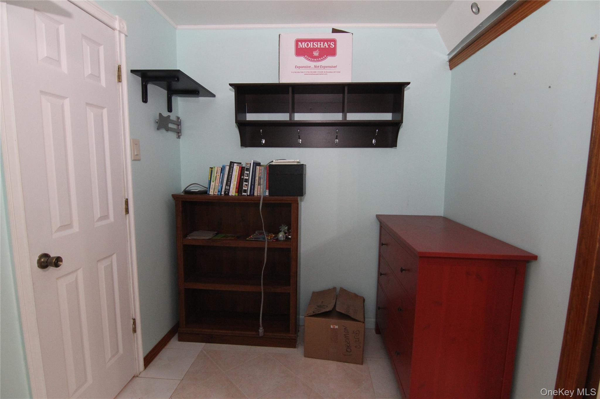 191 Sylvan Lake Road, Unit 16 Hopewell Junction, NY 12533 - Photo 21 of 34 a view of a livingroom with furniture and cabinet