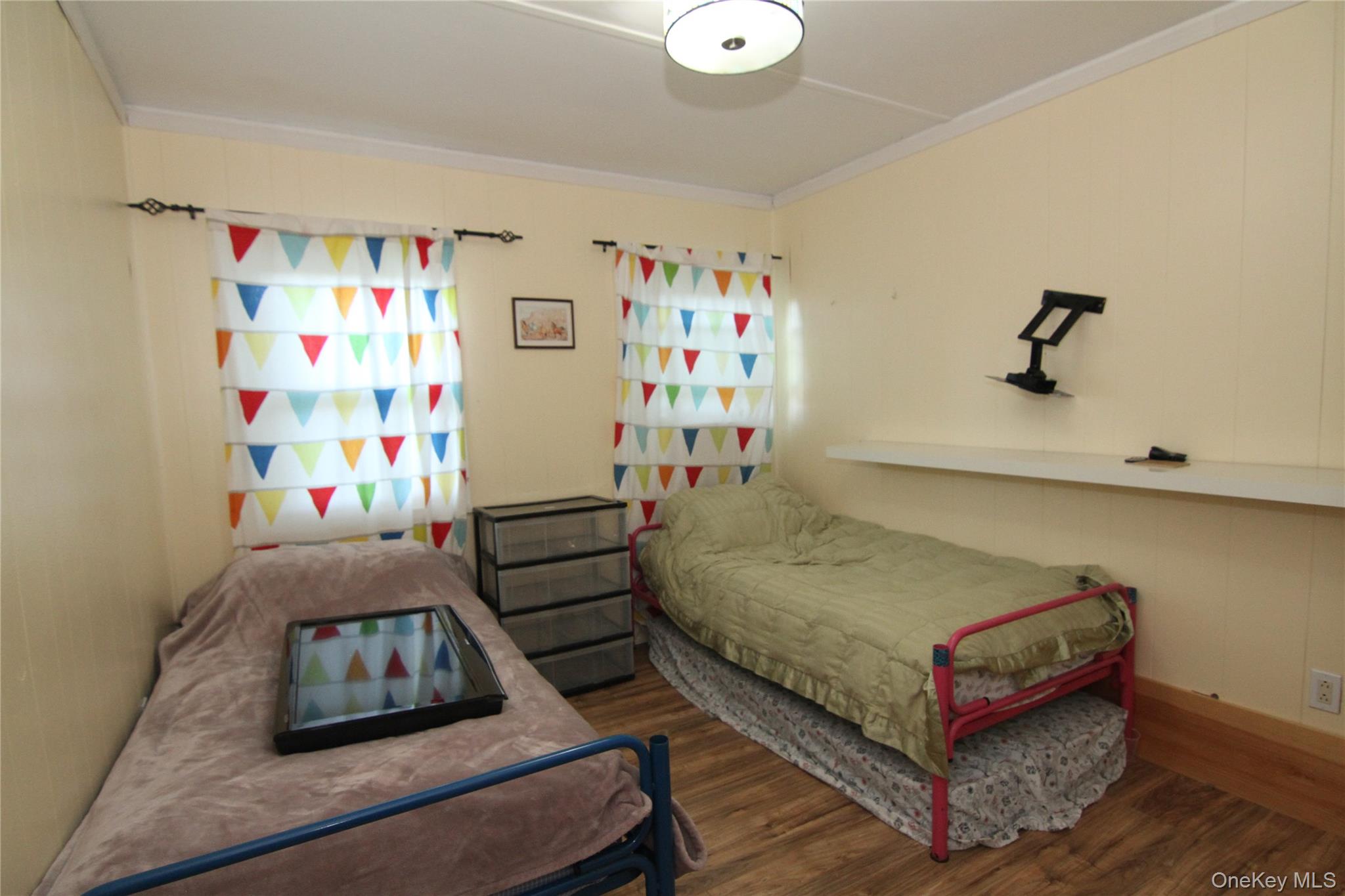 191 Sylvan Lake Road, Unit 16 Hopewell Junction, NY 12533 - Photo 24 of 34 a bedroom with a bed and a window