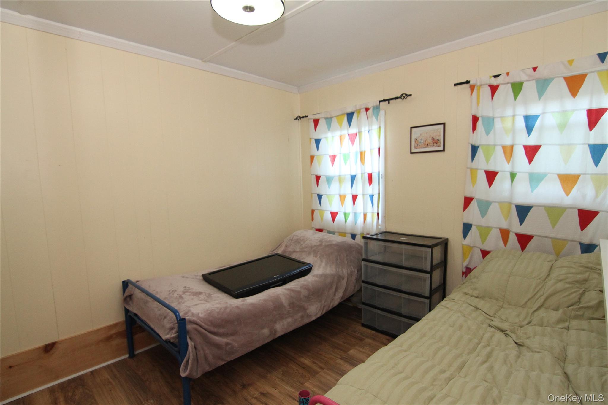 191 Sylvan Lake Road, Unit 16 Hopewell Junction, NY 12533 - Photo 25 of 34 a bedroom with a bed and a window