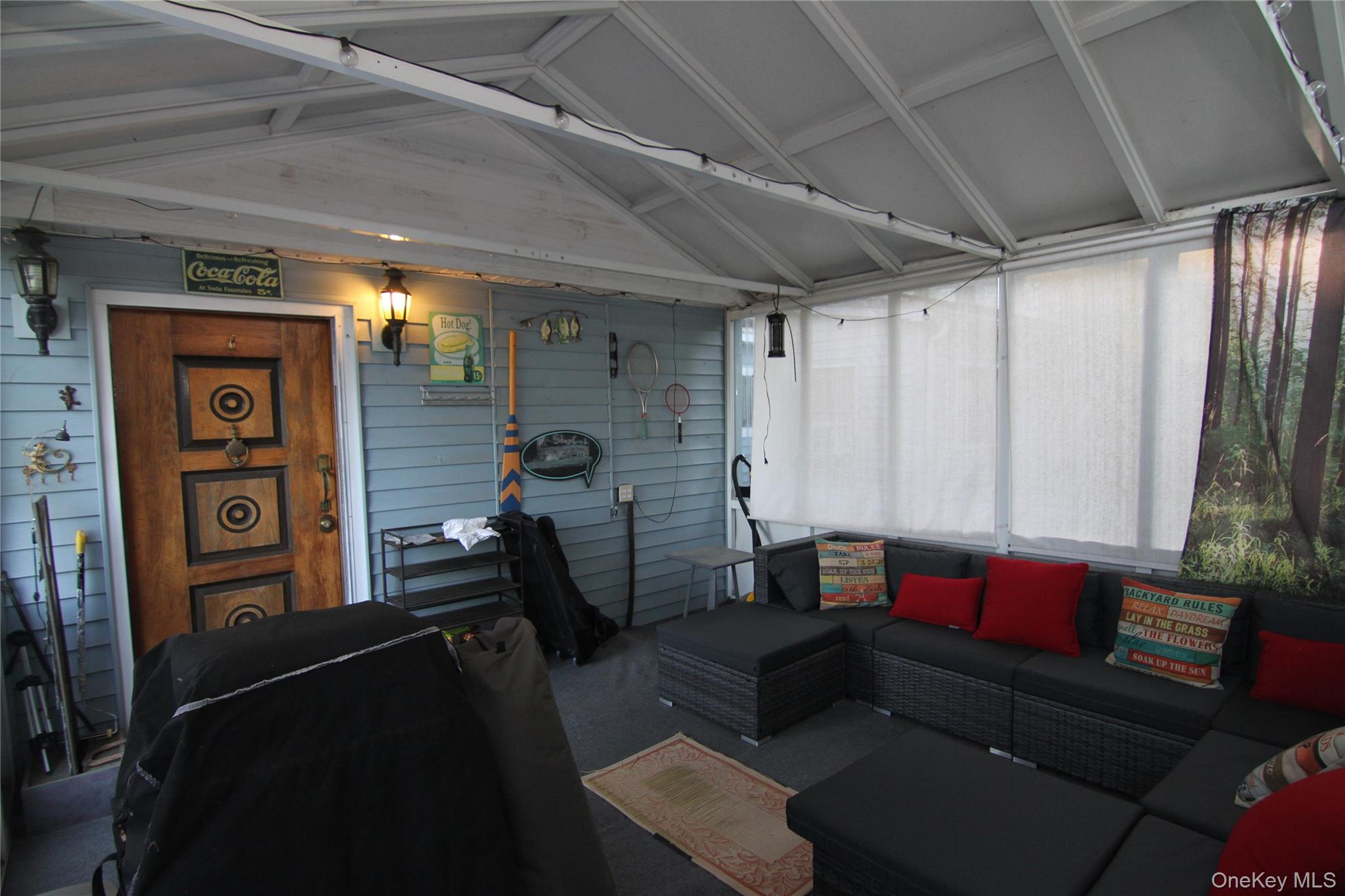 191 Sylvan Lake Road, Unit 16 Hopewell Junction, NY 12533 - Photo 10 of 34 a living room with furniture and a window