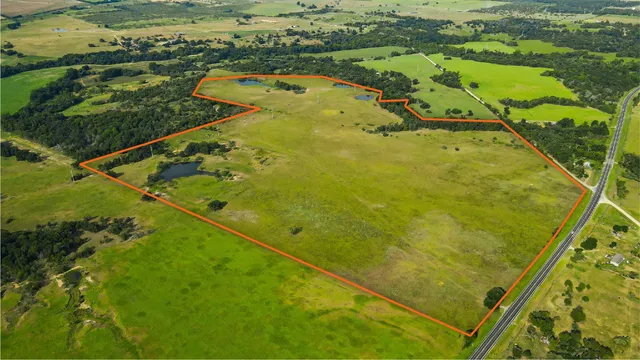 a view of swimming pool from a balcony